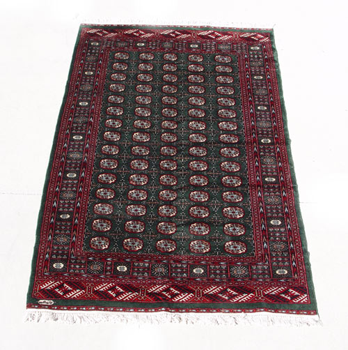 Appraisal: HANDMADE PAKISTAN BOKHARA CARPET ' '' X ' '' Dark