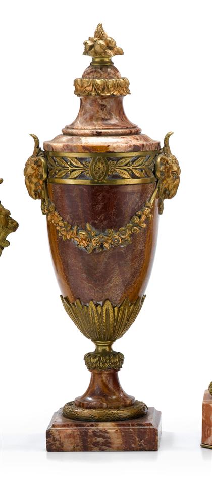 Appraisal: Pair of gilt metal mounted pink marble urns Each of