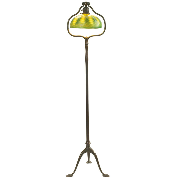 Appraisal: Nice Tiffany Studios floor lamp bronze three-footed base holding a