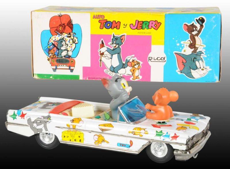 Appraisal: Rico Spanish Battery-Operated Tom Jerry Auto Description Includes original box