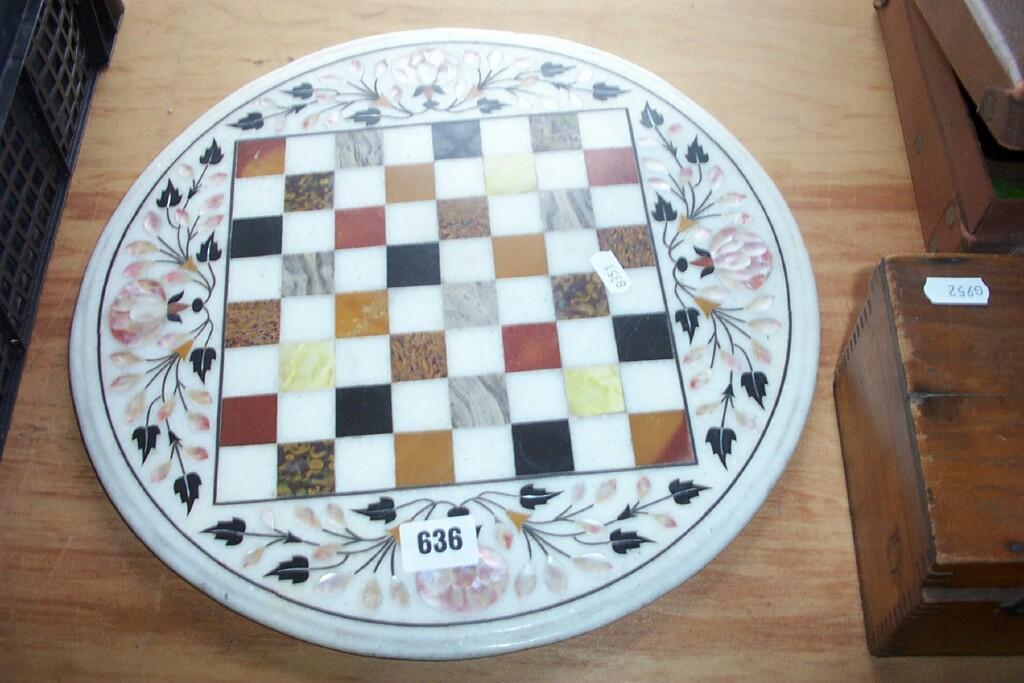 Appraisal: A continental circular table top with specimen hard stone chess