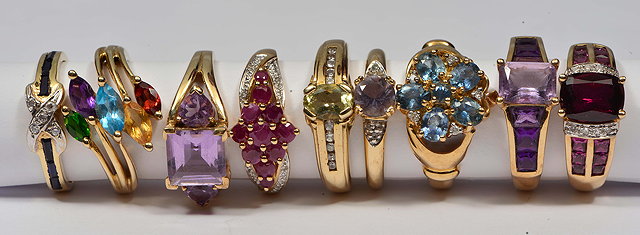 Appraisal: A GROUP OF NINE CT GOLD RINGS set with various