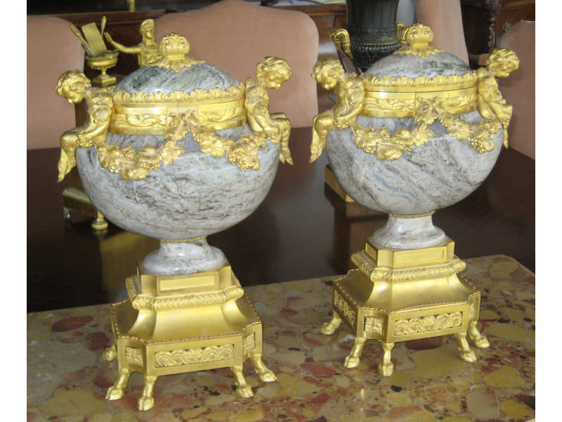 Appraisal: PAIR OF FRENCH BRONZE AND MARBLE CASSOLETTES Each marble urn-form