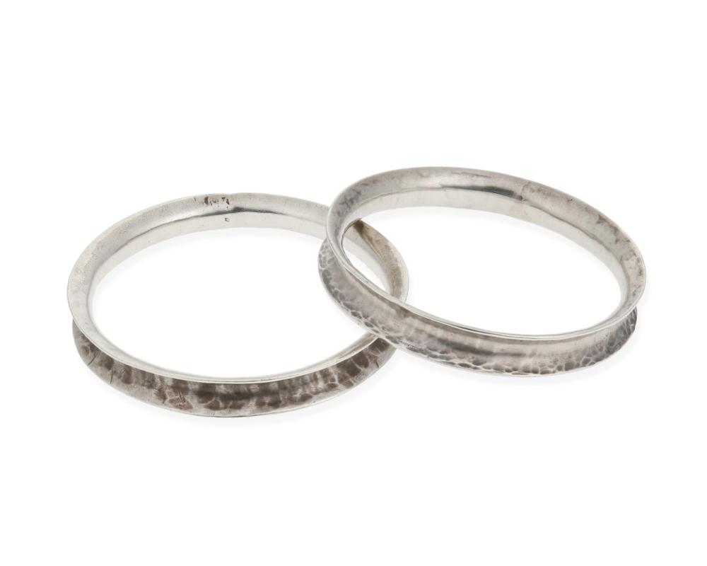 Appraisal: William Spratling - American A pair of silver bangle bracelets