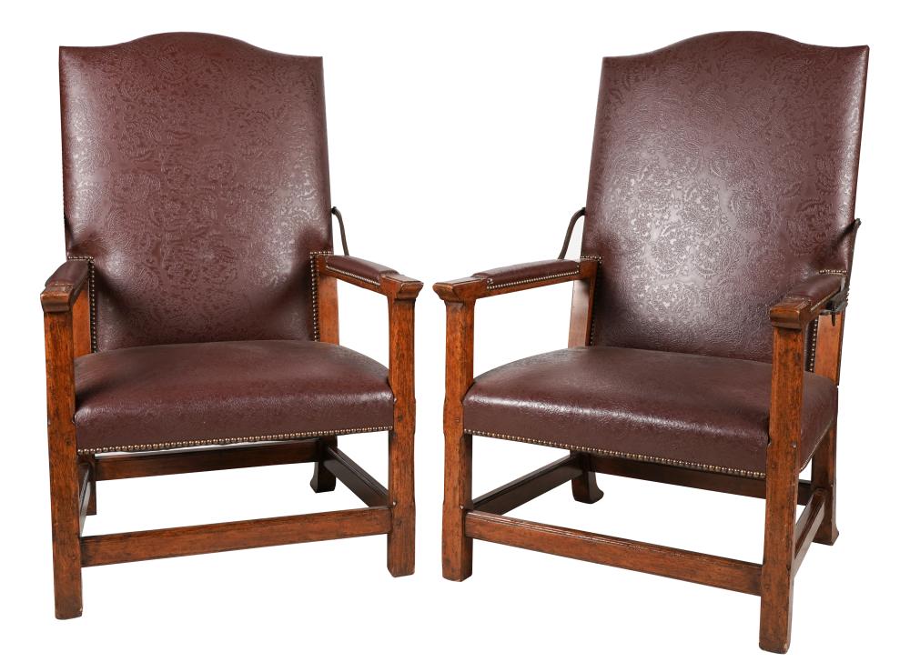 Appraisal: PAIR OF EMBOSSED LEATHER ARMCHAIRS th century with manufacturer's label