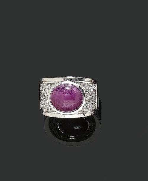 Appraisal: RUBY AND BRILLIANT-CUT DIAMOND RING White gold Casual-elegant broad band