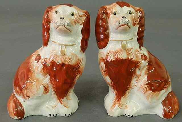 Appraisal: Pair of th c Staffordshire red and white seated spaniels