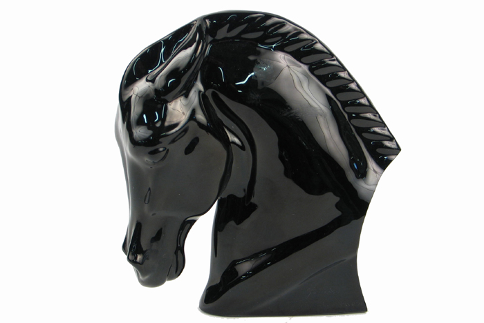 Appraisal: A RARE BLACK ART GLASS HEAD OF A HORSE by