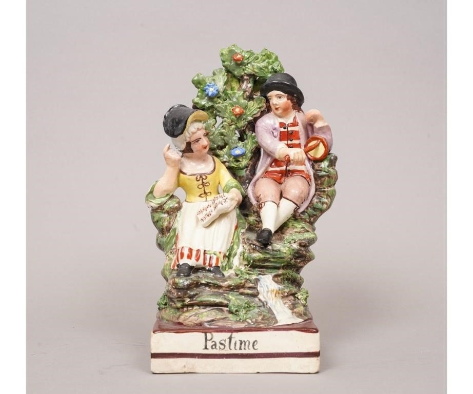 Appraisal: Staffordshire figure titled Pastime depicting a man playing a bagpipe