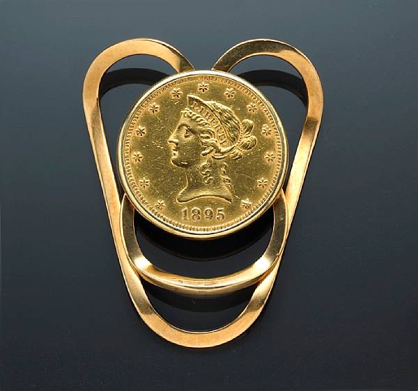 Appraisal: A gold coin money clip featuring an US Liberty head