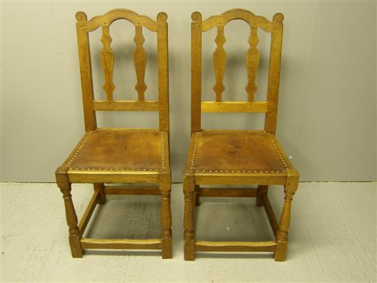 Appraisal: Set of eight oak dining chairs by Robert Mouseman Thompson