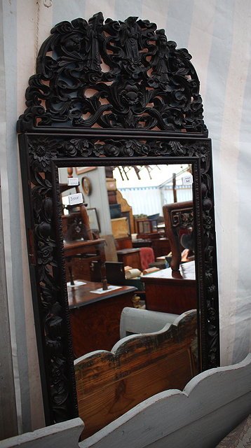 Appraisal: AN ORIENTAL CARVED HARDWOOD SCREEN PANEL later inset with a