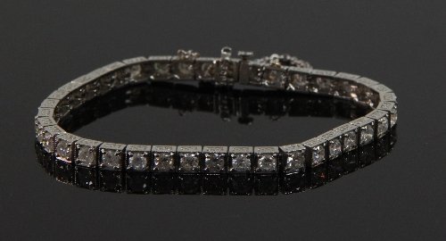 Appraisal: A diamond tennis bracelet the brilliant cut diamonds claw set