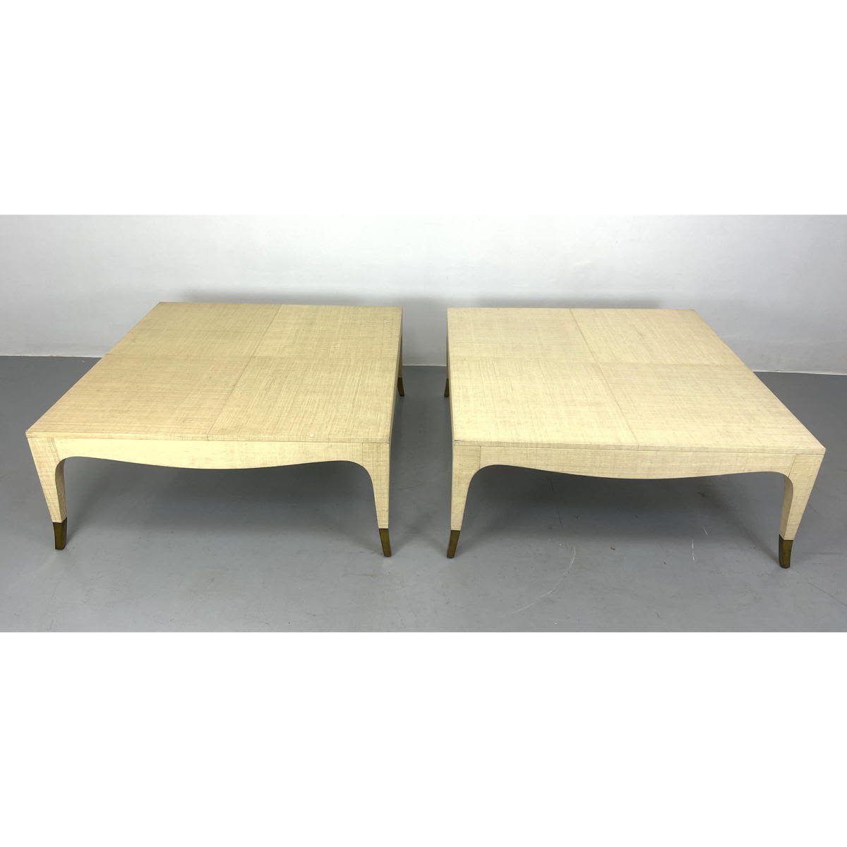 Appraisal: Pair Large Grass Cloth Covered Coffee Tables Brass capped feet