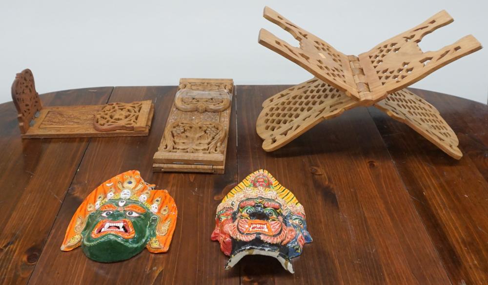 Appraisal: COLLECTION OF SOUTH ASIAN PAINTED MASKS AND CARVED WOOD ADJUSTABLE