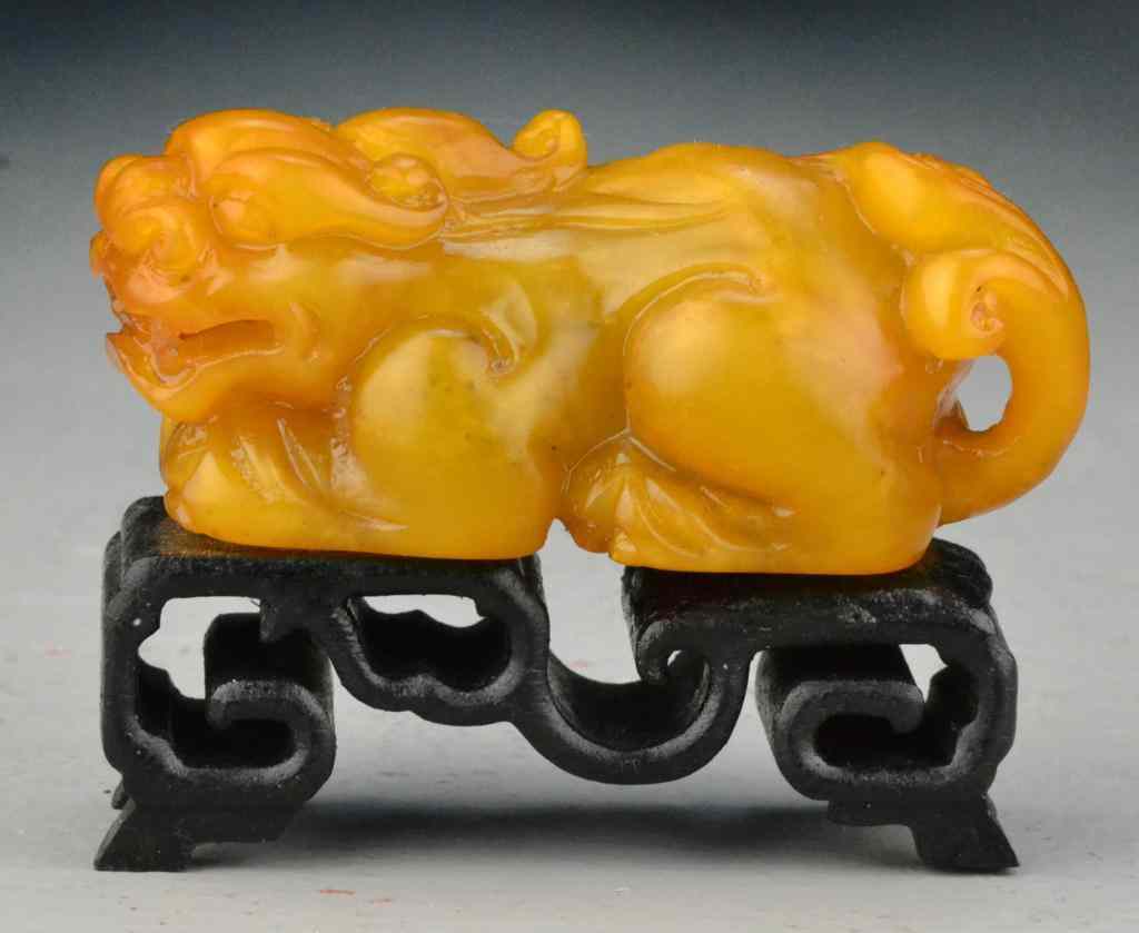 Appraisal: Chinese Tianhuang Stone Carved DragonFinely carved to depict a resting