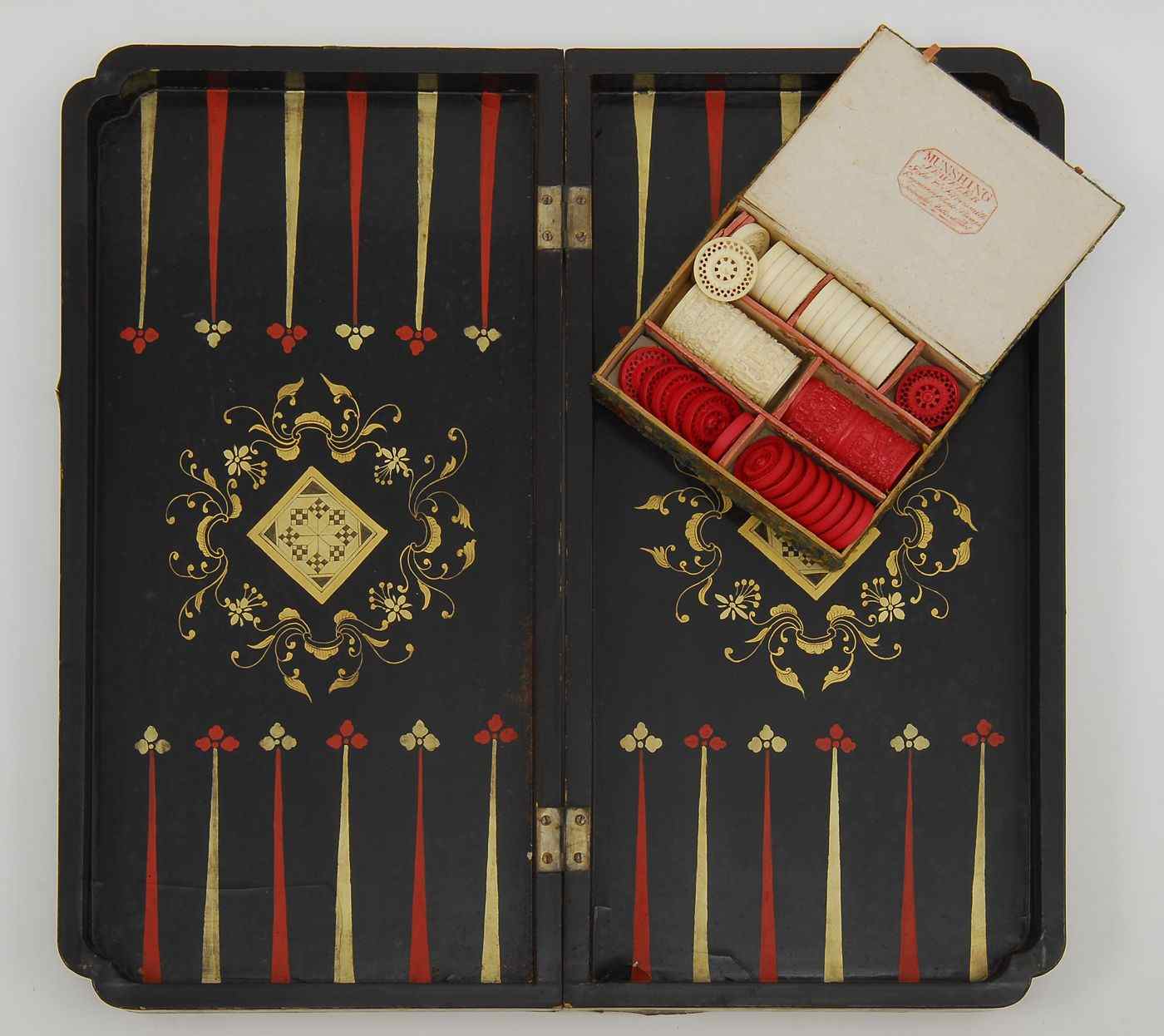 Appraisal: CHINESE BLACK AND GOLD LACQUER GAMES BOX th CenturyContaining playing