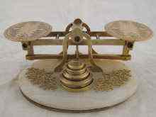 Appraisal: A set of gilt metal postal scales on marble base