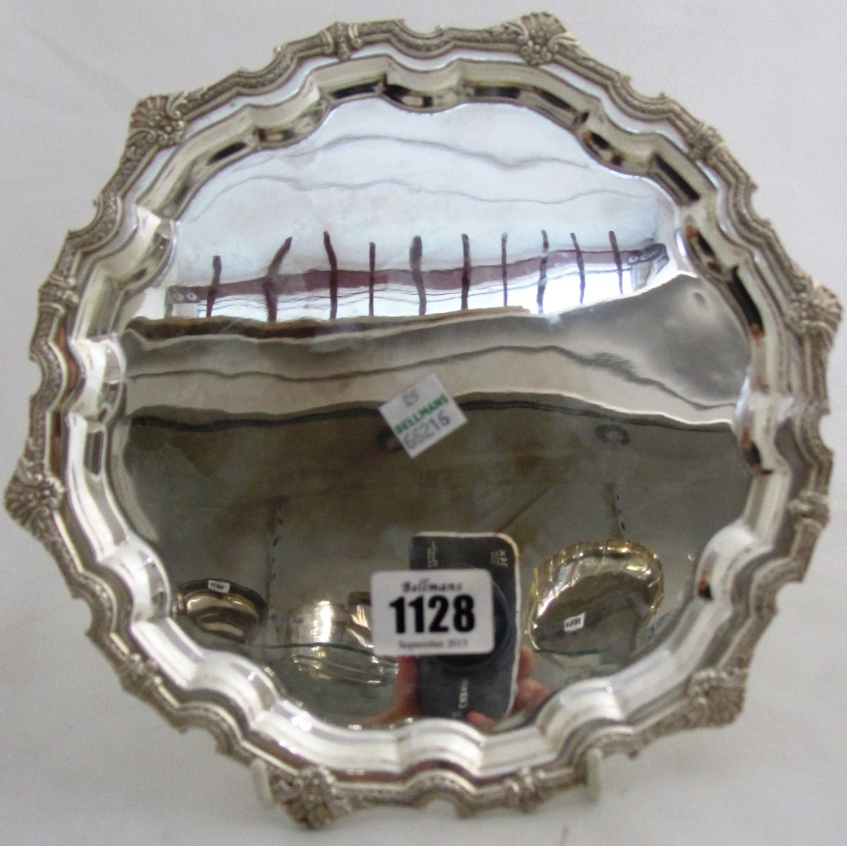 Appraisal: A silver salver of shaped circular form with a decorated