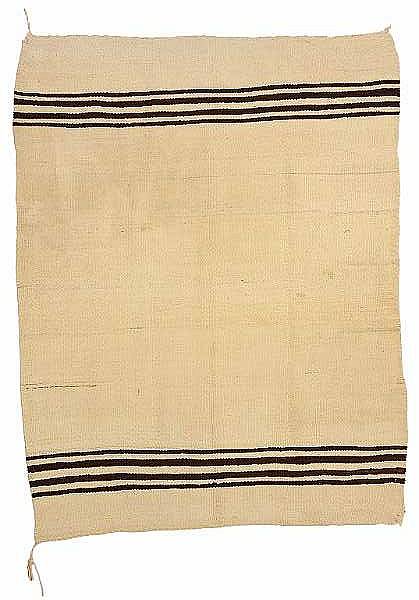 Appraisal: A Navajo Pueblo transitional blanket Softly woven with bands of