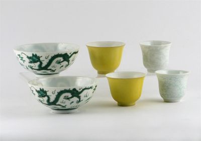 Appraisal: A pair of Chinese lemon yellow ground small flared bowls