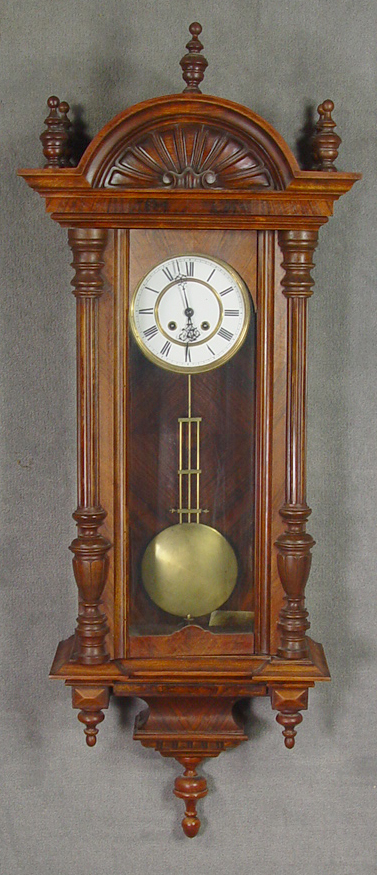 Appraisal: Becker Walnut Regulator Clock Circa White Roman enamel dial Carved