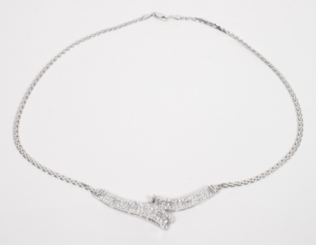 Appraisal: Lady's K white gold and diamond necklace centering two ribbon