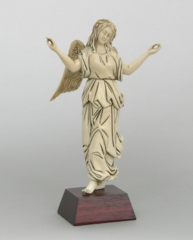 Appraisal: A Continental Carved Ivory Angel A Continental carved ivory angel