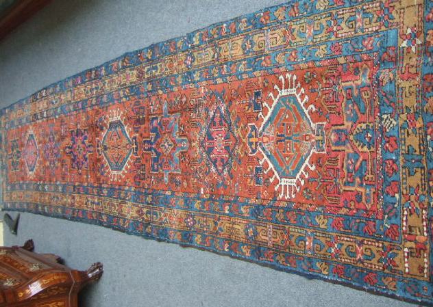 Appraisal: A Karajar runner North West Persian the madder field with