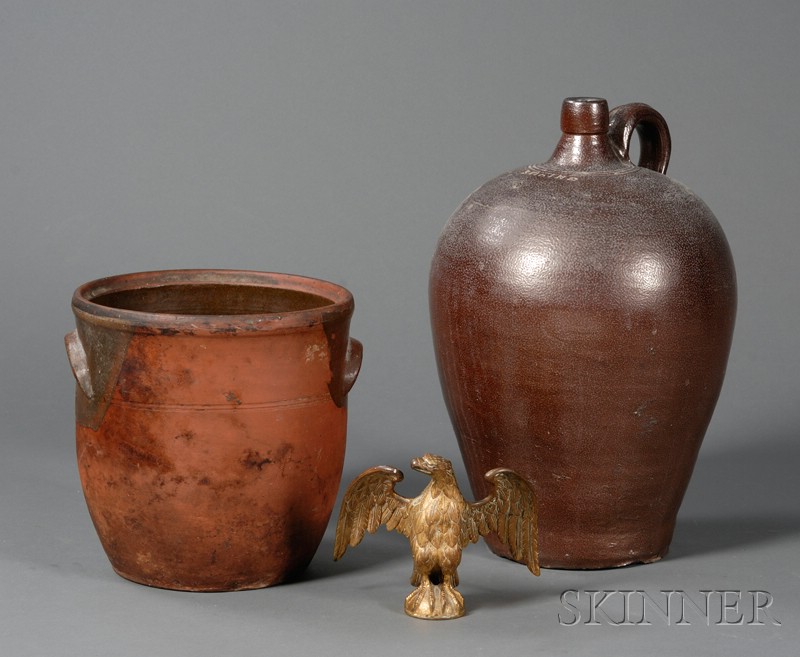 Appraisal: Redware Jar Stoneware Jug and a Cast Gilt-brass Eagle America