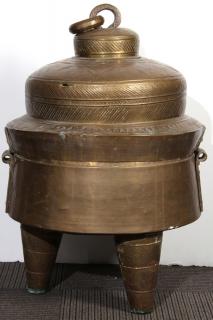 Appraisal: North African Brass Lidded Grain Container Geometric incising and tripod