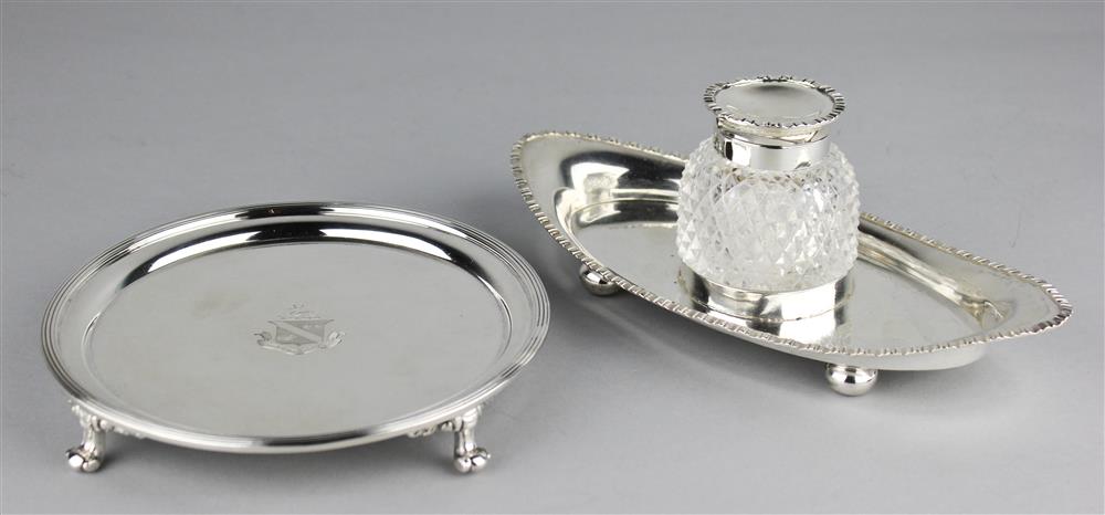 Appraisal: AMERICAN SILVER ARMORIAL CIRCULAR SALVER AND AN ENGLISH SILVER MOUNTED