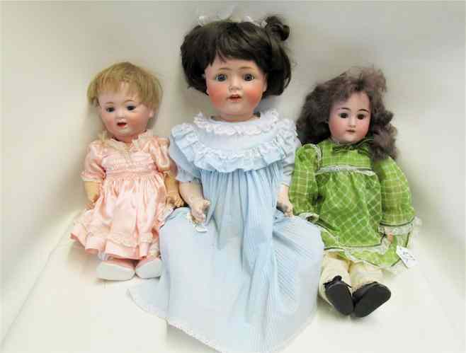 Appraisal: THREE BISQUE SOCKET HEAD DOLLS Japanese Morimura Bros character doll