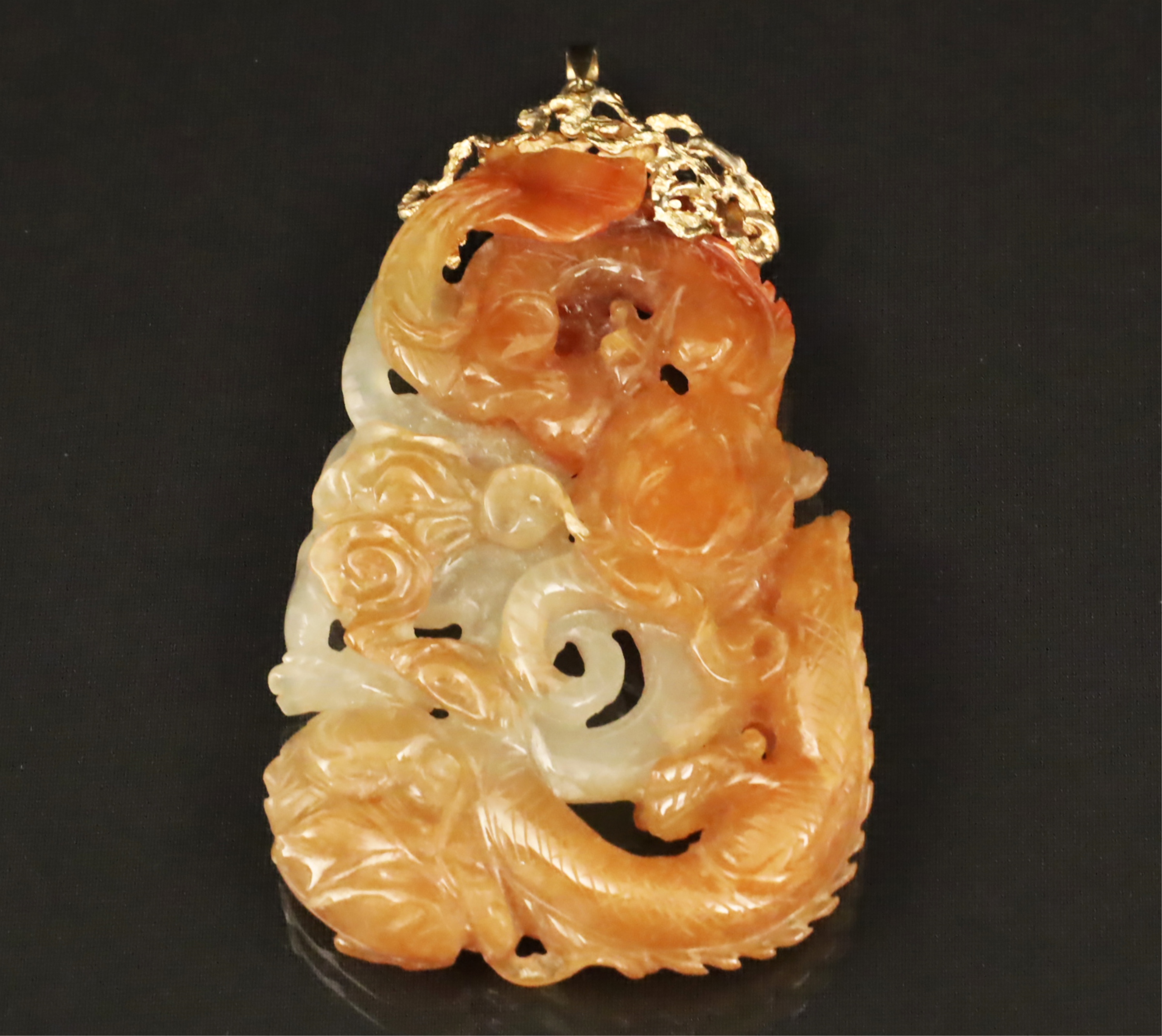 Appraisal: K MTD MUTTON FAT JADE ORIENTAL CARVED PENDANT K mounted