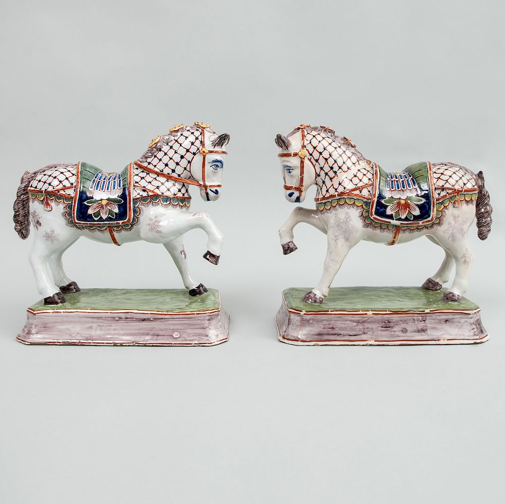 Appraisal: Pair of Dutch Polychrome Delft Models of Prancing Horses Each