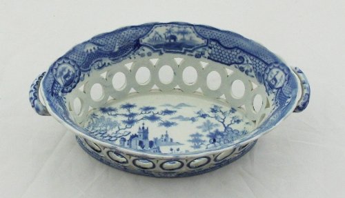 Appraisal: A Gothic Castle pattern blue and white chestnut basket two-handled