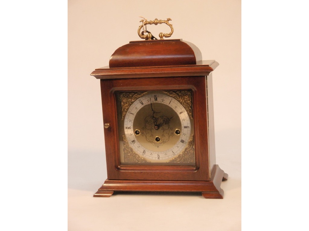 Appraisal: A reproduction George II style mahogany cased mantel clock with