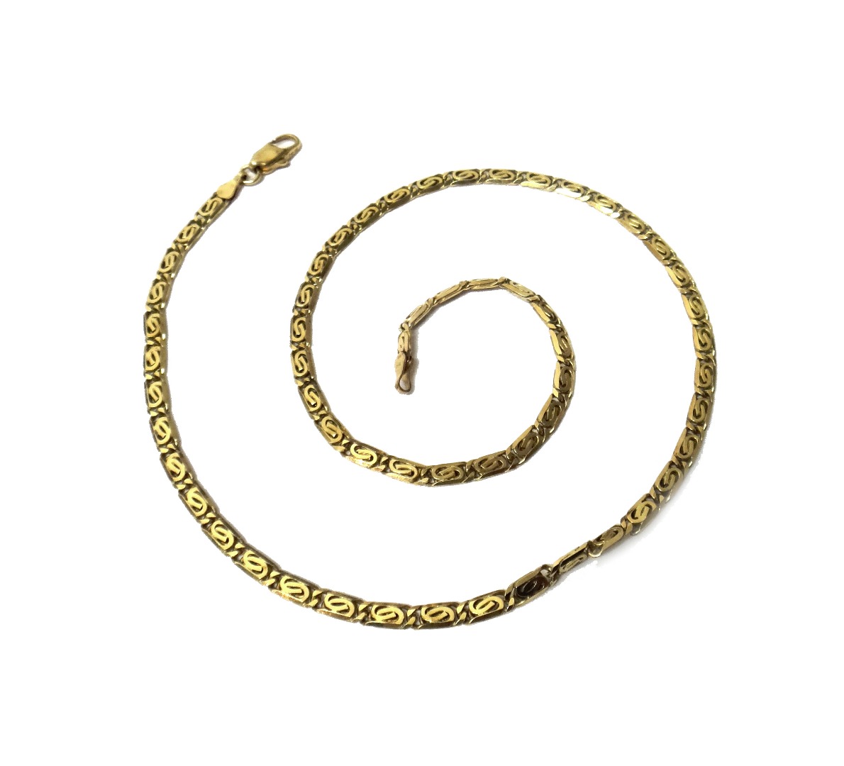 Appraisal: A gold neckchain in a multiple link design detailed on