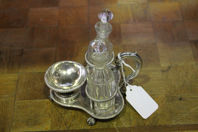 Appraisal: A VICTORIAN SILVER CRUET of trefoil shaped form beaded borders