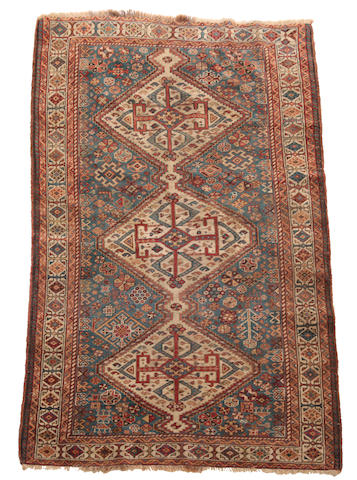 Appraisal: A Kashgai Rug The pale blue field with three conjoined