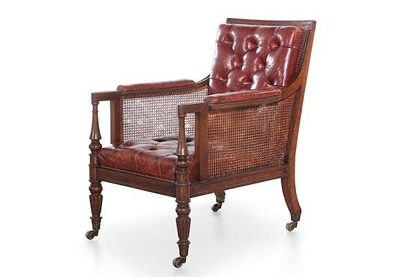 Appraisal: A good Regency mahogany and cane paneled bergere A good