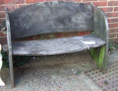 Appraisal: A th century elm bowfronted garden bench of plank and