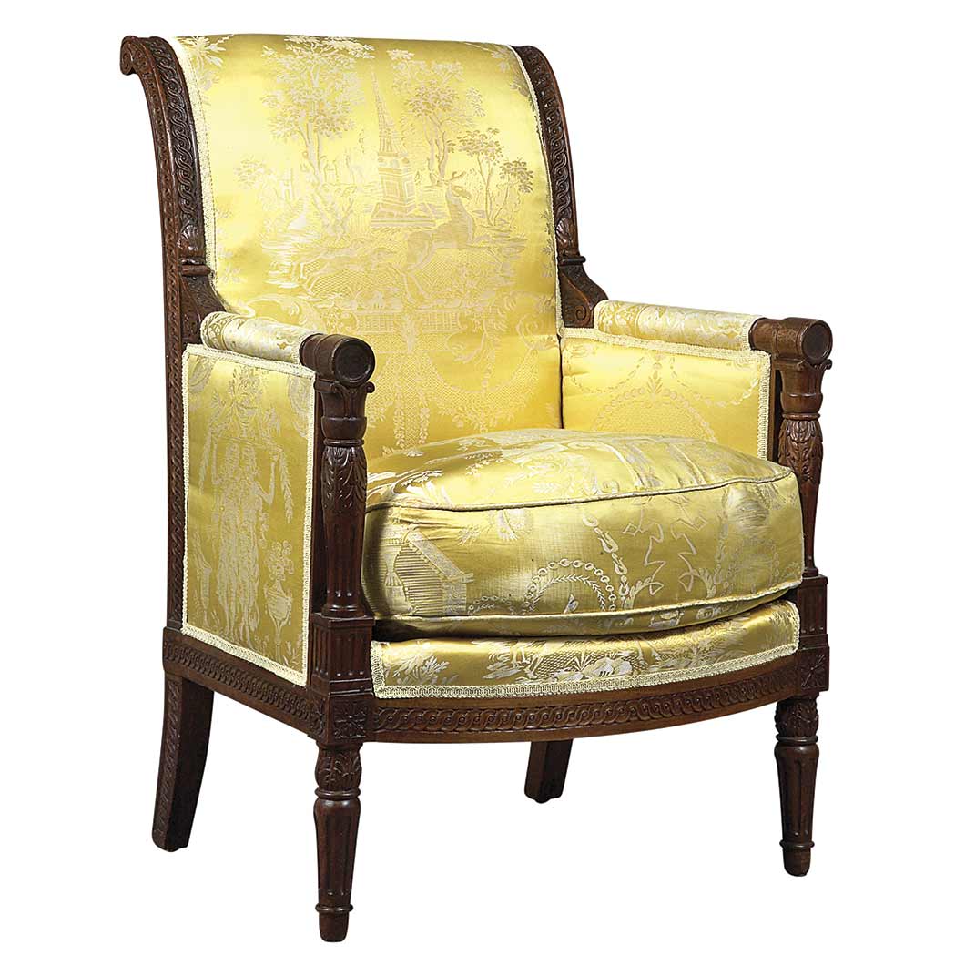 Appraisal: Empire Mahogany Bergere Circa The rectangular padded backrest outlined with