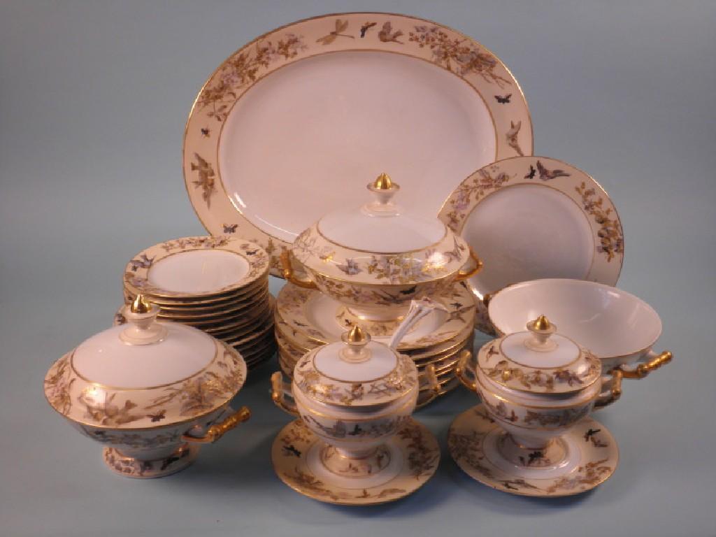 Appraisal: A Limoges type part dinner service decorated with insects birds