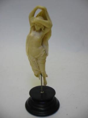 Appraisal: A EUROPEAN CARVED IVORY FIGURE OF A NAKED SYLPH late