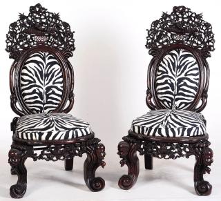 Appraisal: AN EXTRAORDINARY PAIR OF ANGLO CHINESE CARVED CHAIRS An exceptional