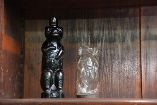 Appraisal: A DARK AMBER GLASS BEAR FIGURAL BOTTLE TOGETHER WITH A