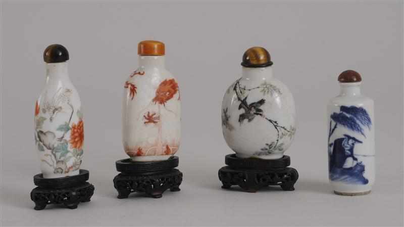 Appraisal: FOUR CHINESE PORCELAIN SNUFF BOTTLES One blue and white with