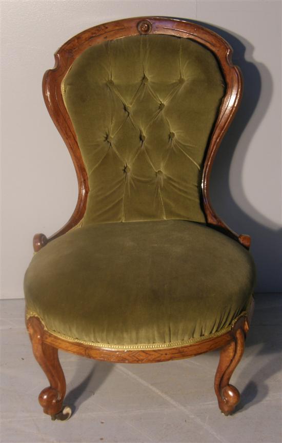 Appraisal: Victorian walnut button backed nursing chair on scroll carved cabriole