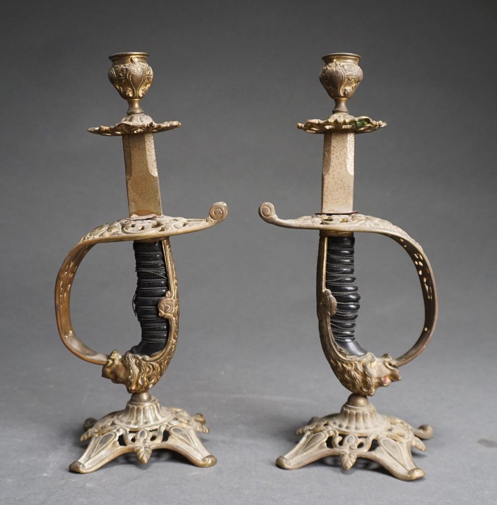 Appraisal: PAIR BRASS SWORD HANDLE CANDLESTICKS H IN CM Pair Brass